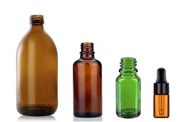 скляні флакони різних кольорів та об'ємів